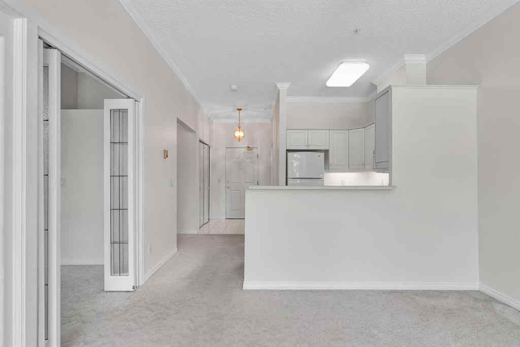 MLS® A2260601 - Unit #108 9449 19 Street SW in Palliser Calgary, Residential