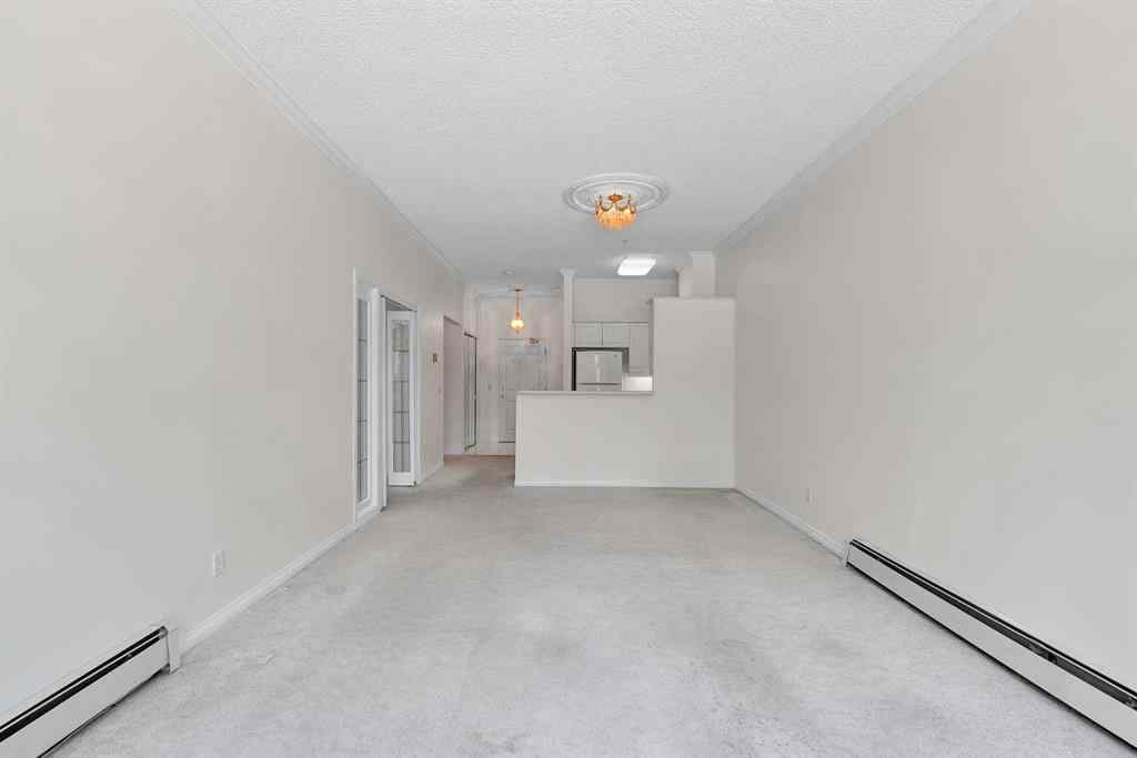 MLS® A2260601 - Unit #108 9449 19 Street SW in Palliser Calgary, Residential