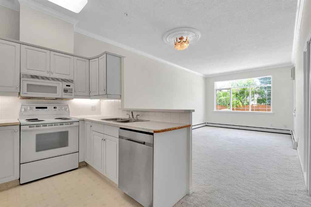 MLS® A2260601 - Unit #108 9449 19 Street SW in Palliser Calgary, Residential