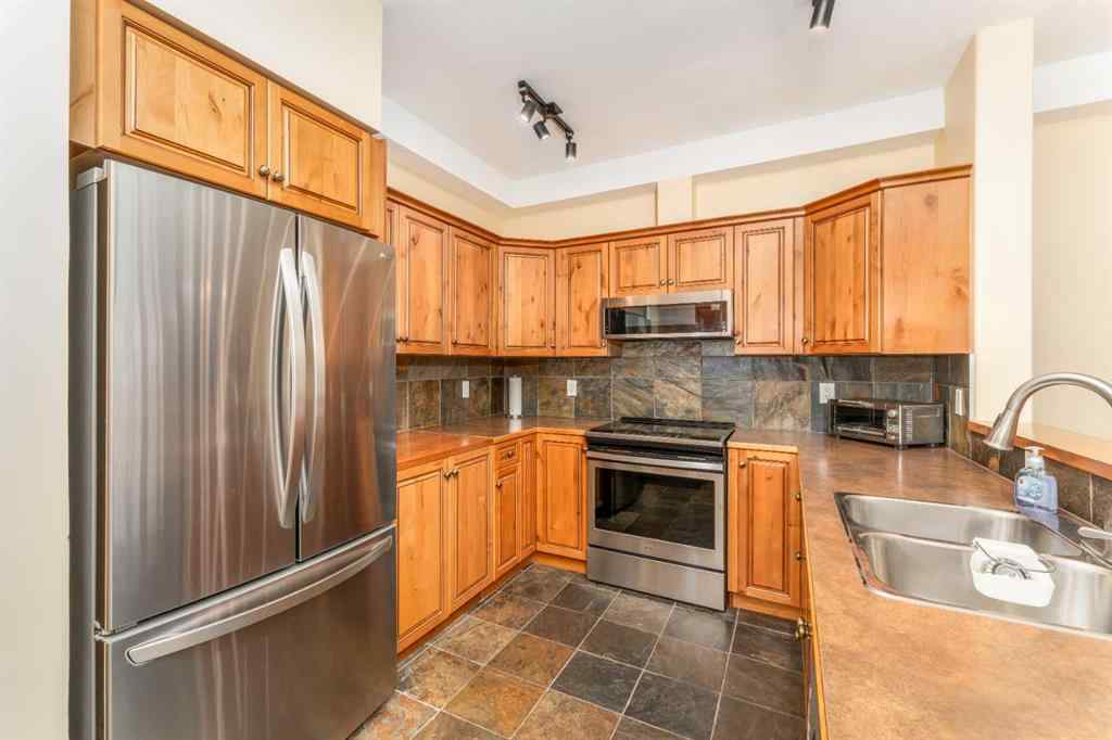MLS® A2260606 - Unit #114 155 Crossbow Place  in Three Sisters Canmore, Residential