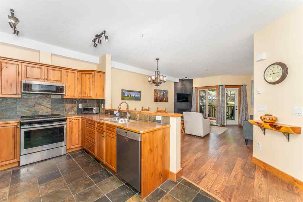 MLS® A2260606 - Unit #114 155 Crossbow Place  in Three Sisters Canmore, Residential
