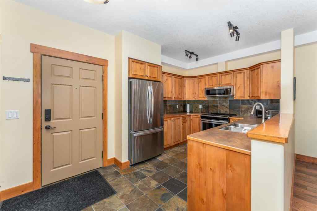 MLS® A2260606 - Unit #114 155 Crossbow Place  in Three Sisters Canmore, Residential