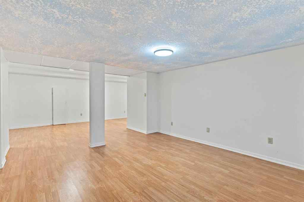 MLS® A2260607 - 1024 Santana Road NW in Sandstone Valley Calgary, Residential