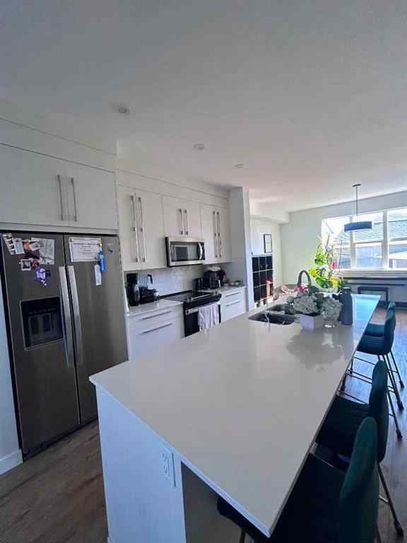 MLS® A2260614 - 217 Dawson Way  in Dawson\'s Landing Chestermere, Residential