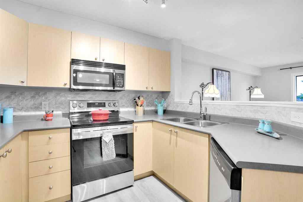 MLS® A2260617 - Unit #6211 304 Mackenzie Way SW in Downtown Airdrie, Residential