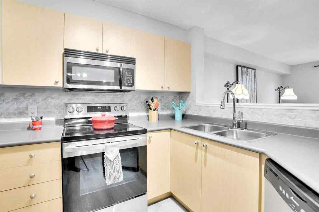 MLS® A2260617 - Unit #6211 304 Mackenzie Way SW in Downtown Airdrie, Residential