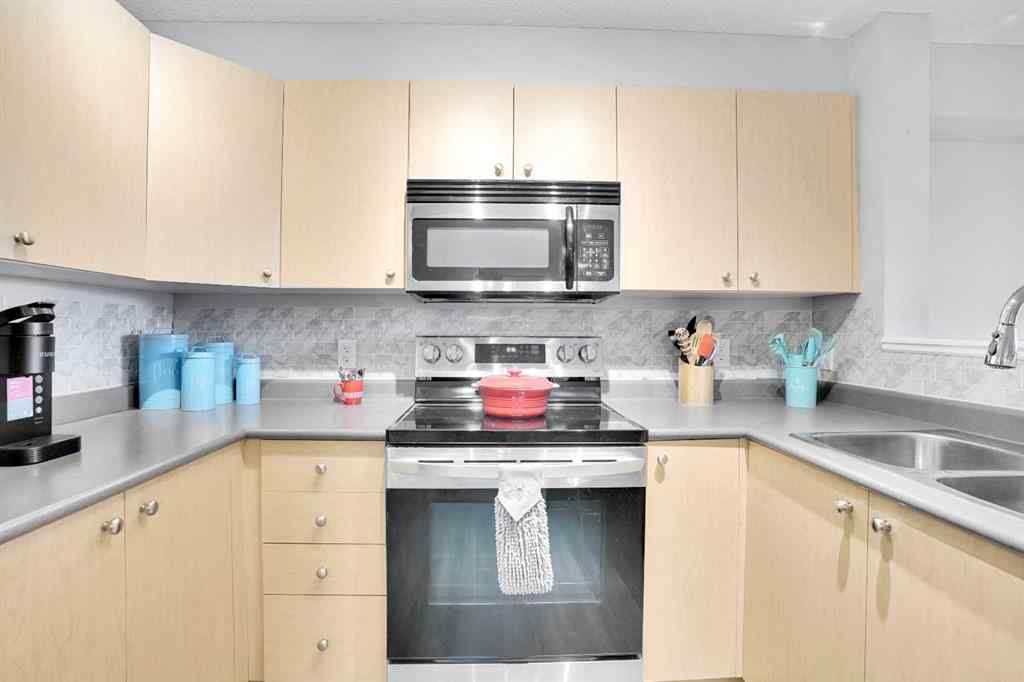 MLS® A2260617 - Unit #6211 304 Mackenzie Way SW in Downtown Airdrie, Residential