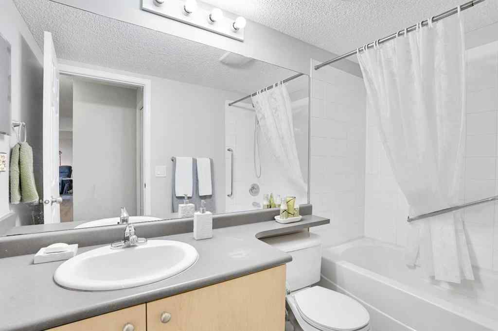 MLS® A2260617 - Unit #6211 304 Mackenzie Way SW in Downtown Airdrie, Residential