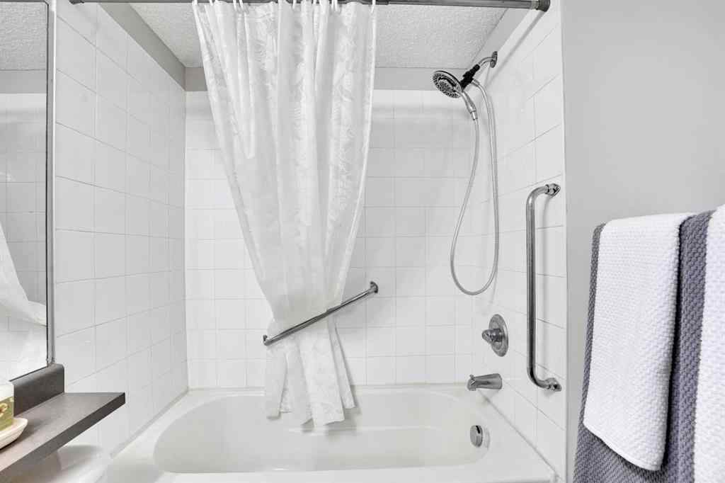 MLS® A2260617 - Unit #6211 304 Mackenzie Way SW in Downtown Airdrie, Residential