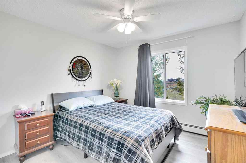 MLS® A2260617 - Unit #6211 304 Mackenzie Way SW in Downtown Airdrie, Residential