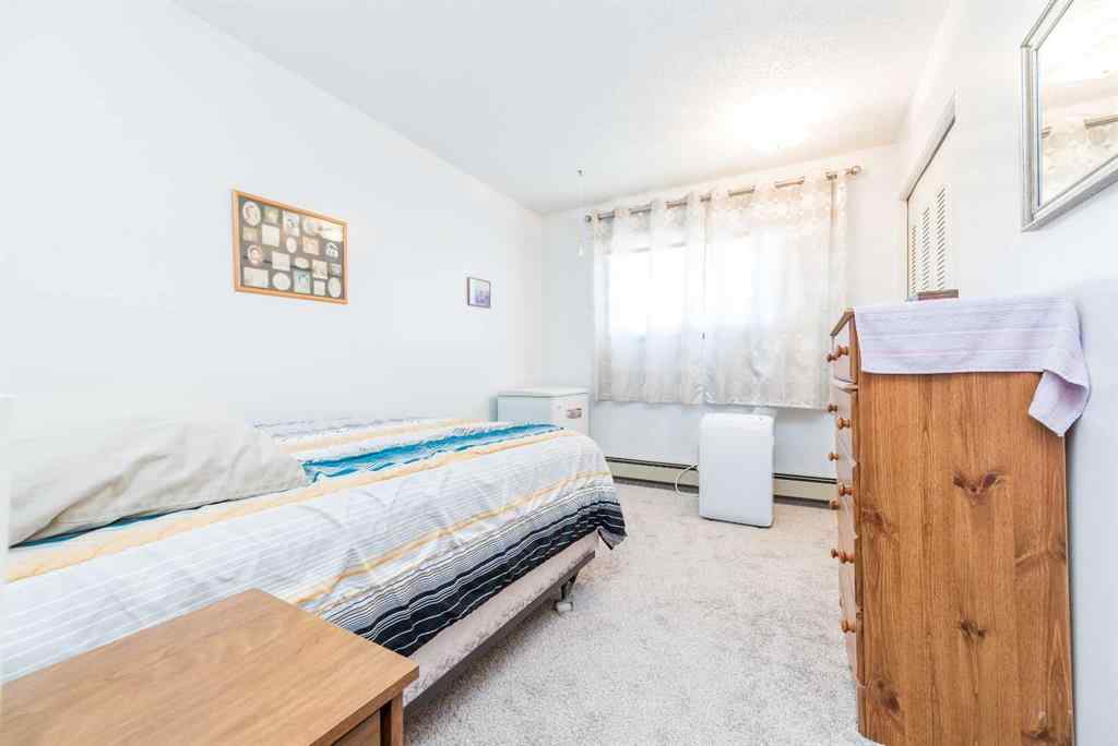 MLS® A2260621 - 10339 105 Street  in NONE Hythe, Multi-Family