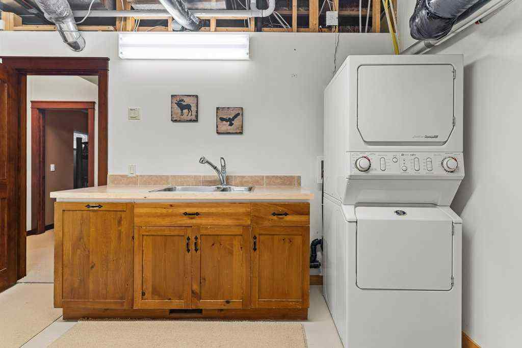 MLS® A2260624 - 16 Blue Grouse Ridge  in Silvertip Canmore, Residential