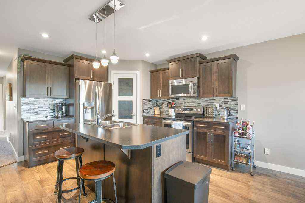 MLS® A2260627 - 371 Lancaster Drive  in Lancaster Meadows Red Deer, Residential