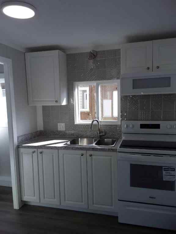 MLS® A2260641 - 236 Polar Avenue NE in North Central High River High River, Mobile