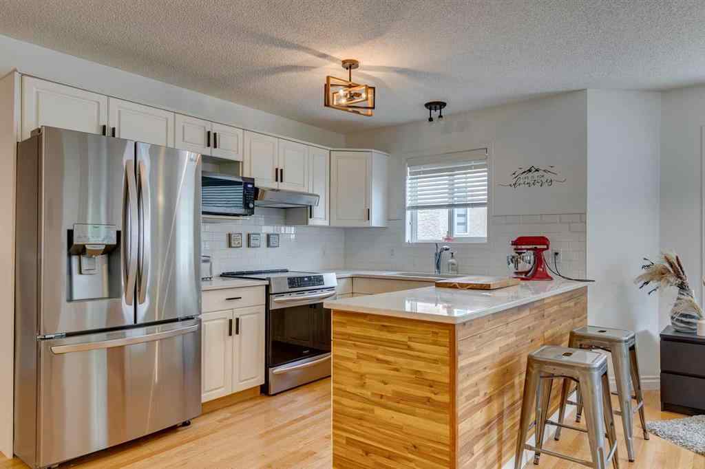 MLS® A2260653 - 42 Sierra Morena Green SW in Signal Hill Calgary, Residential