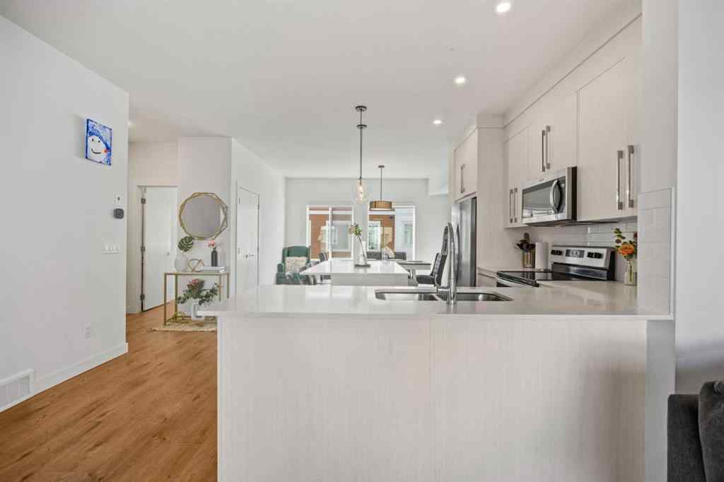 MLS® A2260659 - Unit #602 335 Creekside Boulevard SW in Pine Creek Calgary, Residential