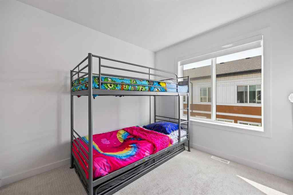 MLS® A2260659 - Unit #602 335 Creekside Boulevard SW in Pine Creek Calgary, Residential