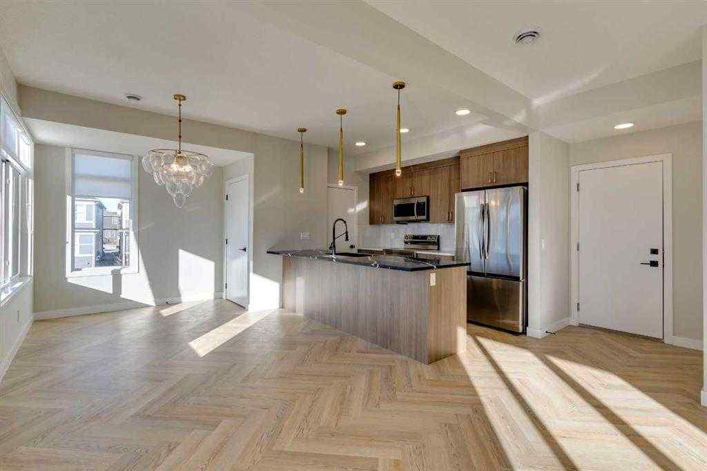 MLS® A2260671 - Unit #107 14800 1 Street  in Livingston Calgary, Residential