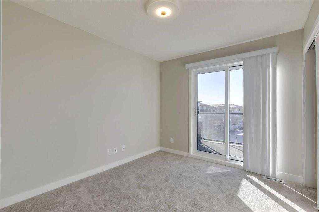 MLS® A2260671 - Unit #107 14800 1 Street  in Livingston Calgary, Residential