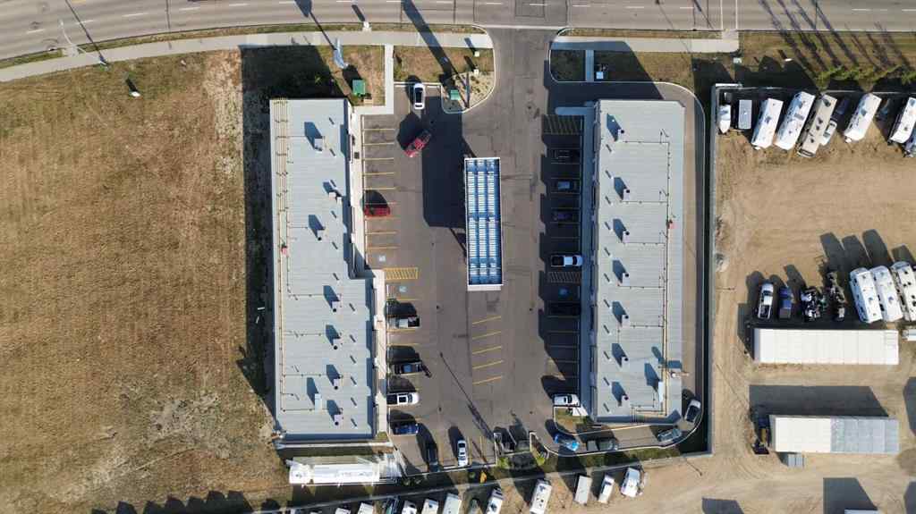 MLS® A2260712 - Unit #105 5302 Vista Trail  in Valley Ridge Blackfalds, Commercial