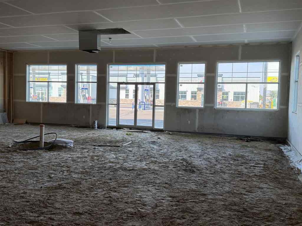 MLS® A2260712 - Unit #105 5302 Vista Trail  in Valley Ridge Blackfalds, Commercial