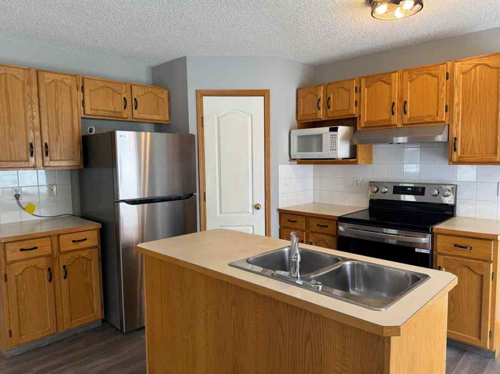 MLS® A2260725 - 22 Arbour Butte Road NW in Arbour Lake Calgary, Residential