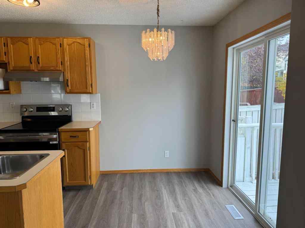 MLS® A2260725 - 22 Arbour Butte Road NW in Arbour Lake Calgary, Residential
