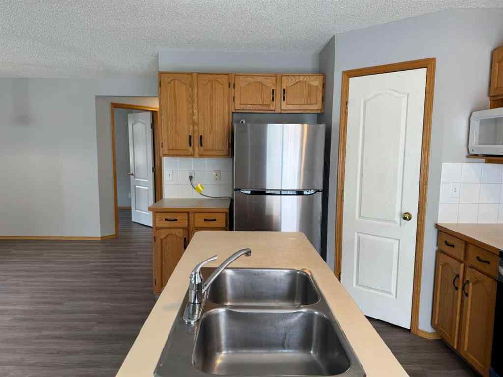 MLS® A2260725 - 22 Arbour Butte Road NW in Arbour Lake Calgary, Residential