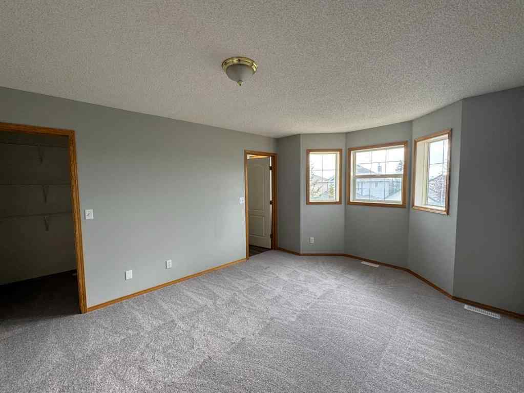 MLS® A2260725 - 22 Arbour Butte Road NW in Arbour Lake Calgary, Residential