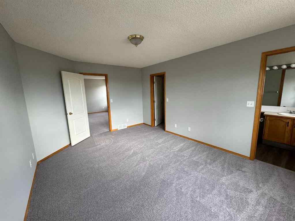 MLS® A2260725 - 22 Arbour Butte Road NW in Arbour Lake Calgary, Residential