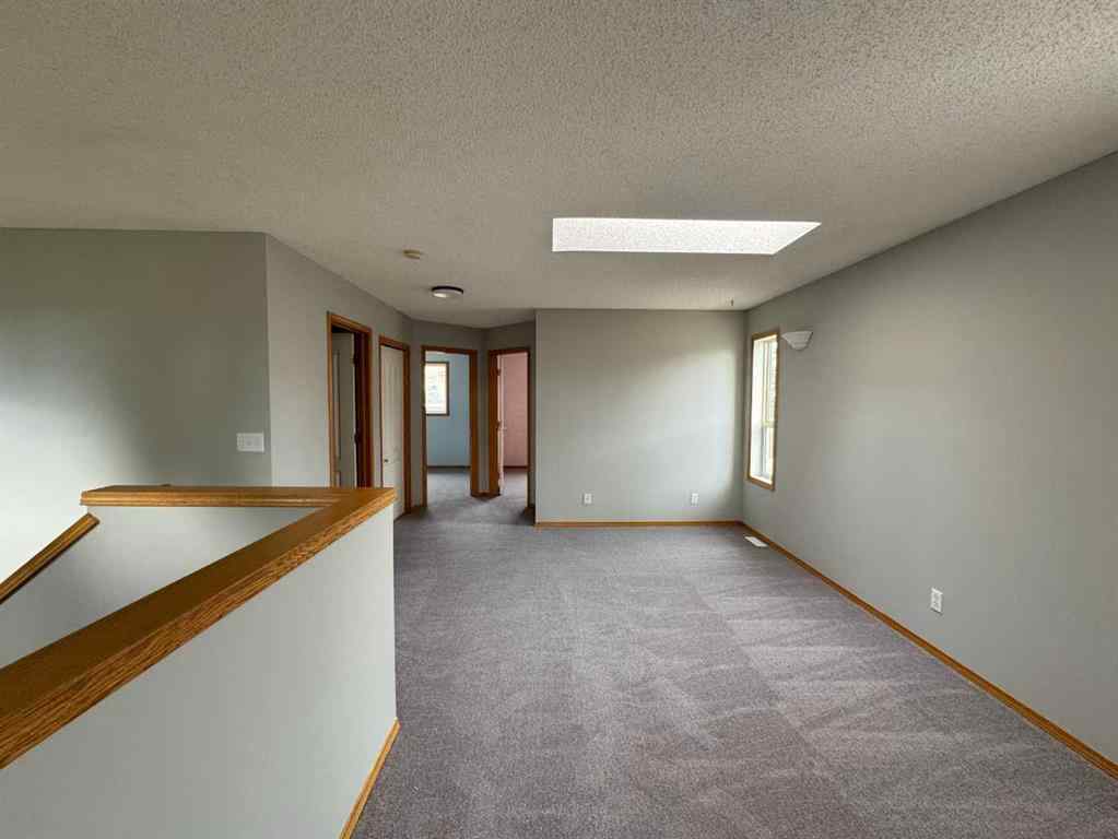 MLS® A2260725 - 22 Arbour Butte Road NW in Arbour Lake Calgary, Residential