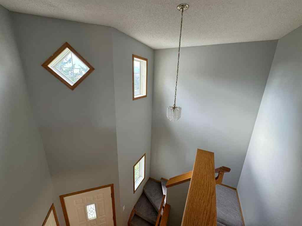 MLS® A2260725 - 22 Arbour Butte Road NW in Arbour Lake Calgary, Residential