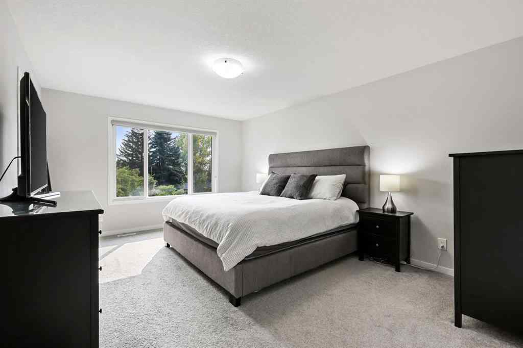 MLS® A2260750 - 186 West Grove Point SW in West Springs Calgary, Residential