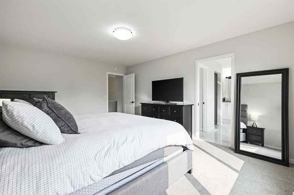 MLS® A2260750 - 186 West Grove Point SW in West Springs Calgary, Residential