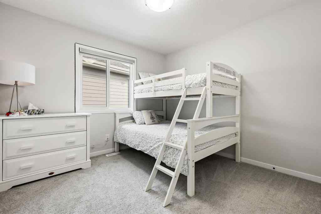 MLS® A2260750 - 186 West Grove Point SW in West Springs Calgary, Residential