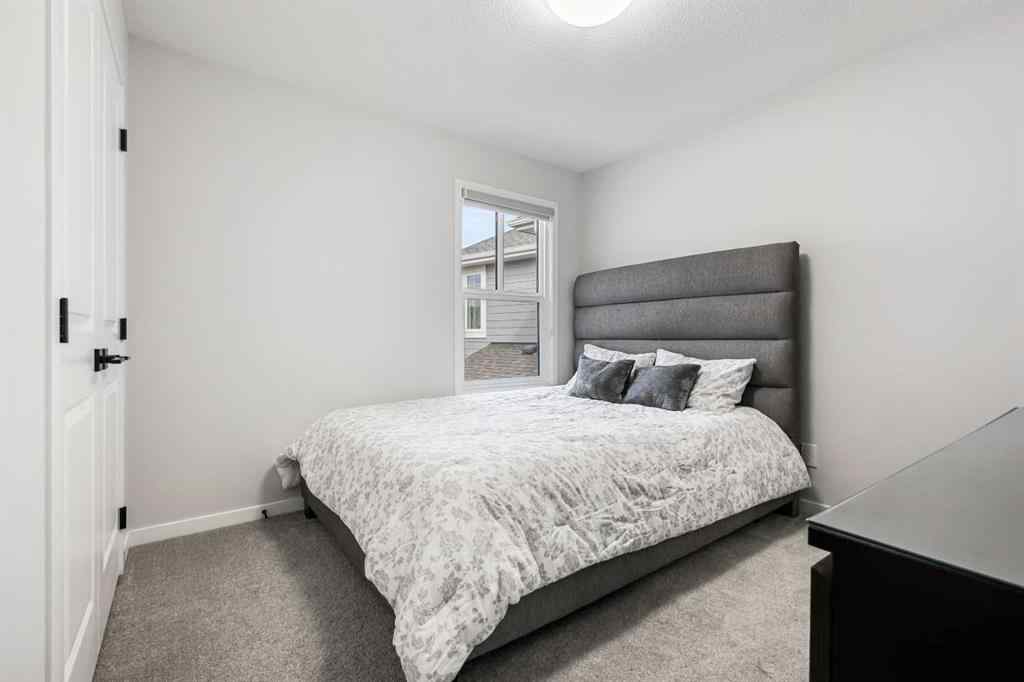 MLS® A2260750 - 186 West Grove Point SW in West Springs Calgary, Residential