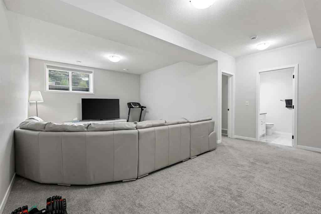 MLS® A2260750 - 186 West Grove Point SW in West Springs Calgary, Residential