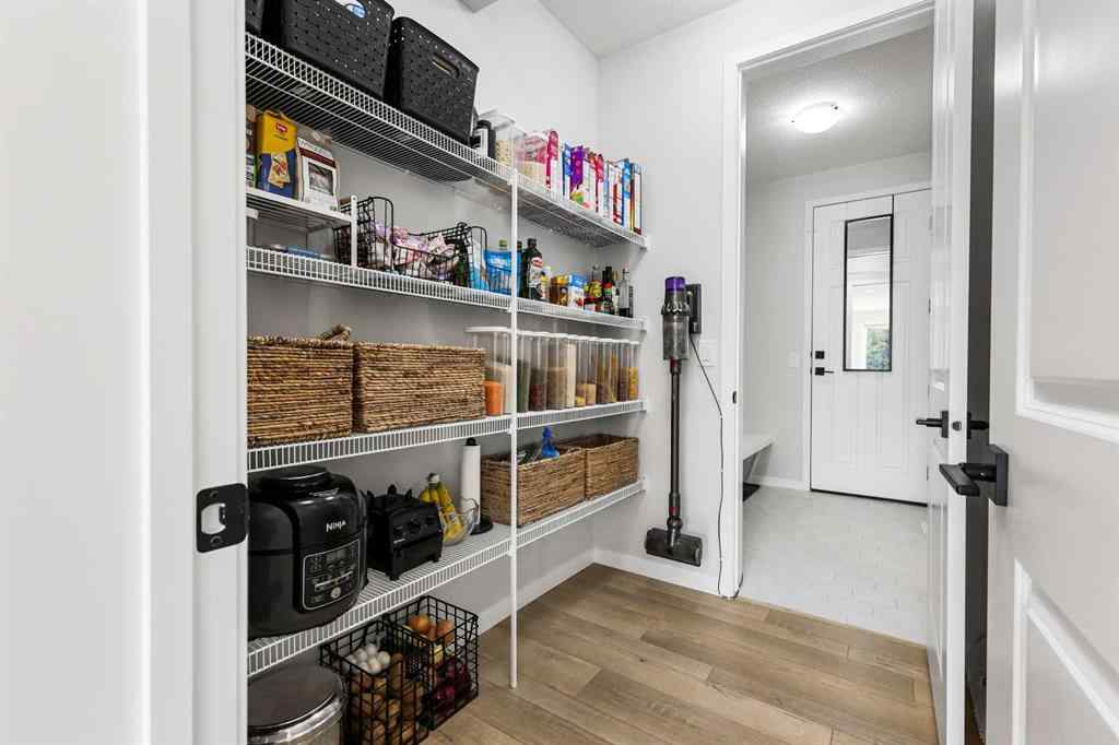 MLS® A2260750 - 186 West Grove Point SW in West Springs Calgary, Residential