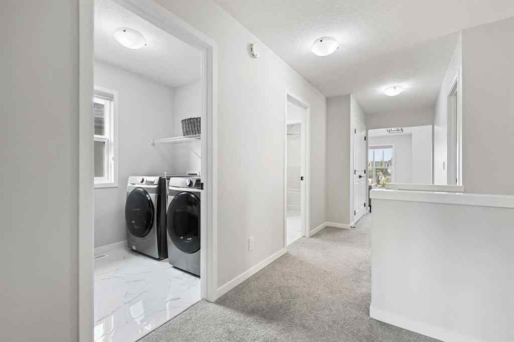 MLS® A2260750 - 186 West Grove Point SW in West Springs Calgary, Residential