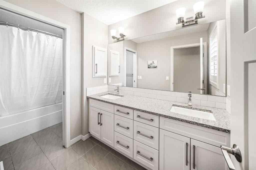 MLS® A2260783 - 220 Auburn Meadows Crescent SE in Auburn Bay Calgary, Residential
