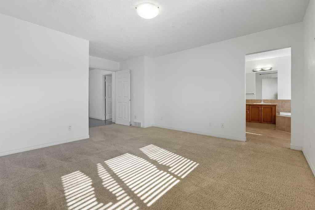 MLS® A2260789 - 45 Everglen Crescent SW in Evergreen Calgary, Residential