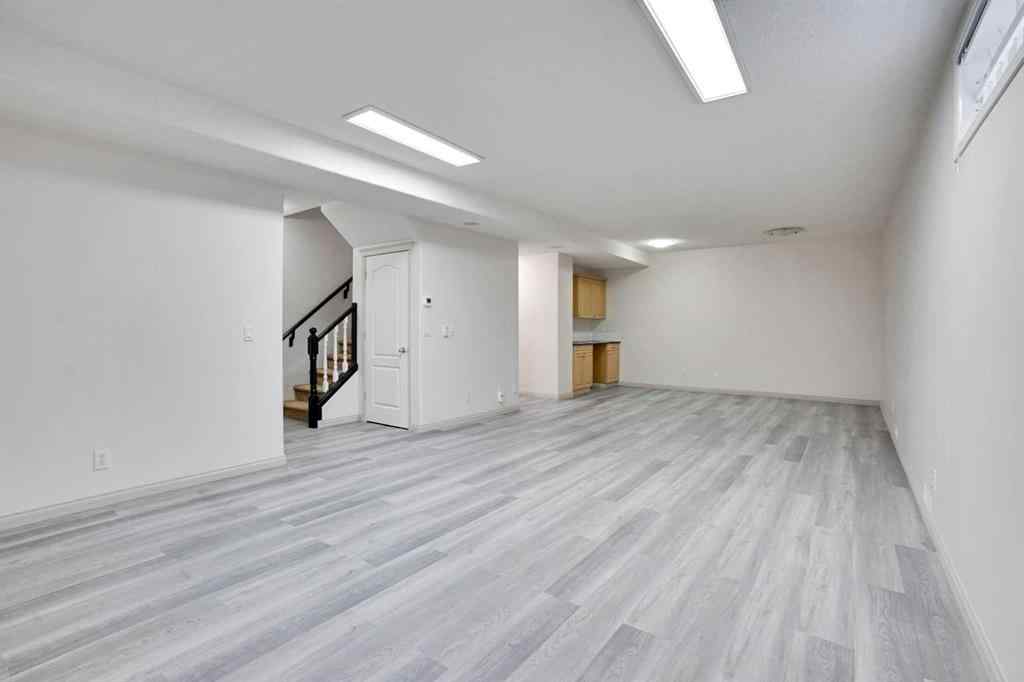 MLS® A2260846 - 38 Strathridge Crescent SW in Strathcona Park Calgary, Residential