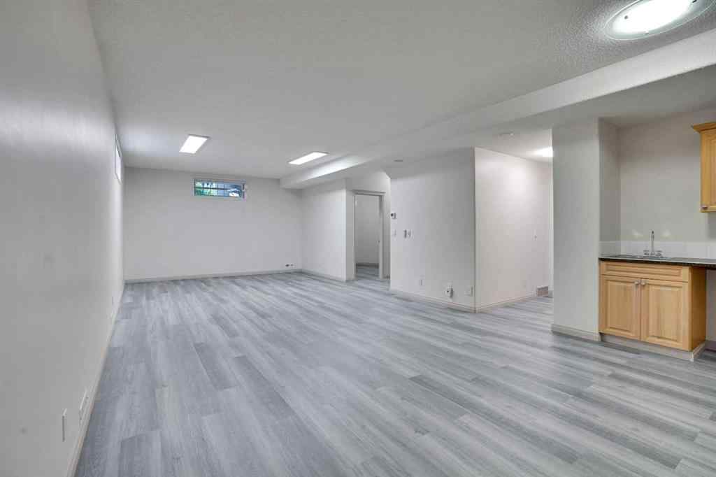 MLS® A2260846 - 38 Strathridge Crescent SW in Strathcona Park Calgary, Residential