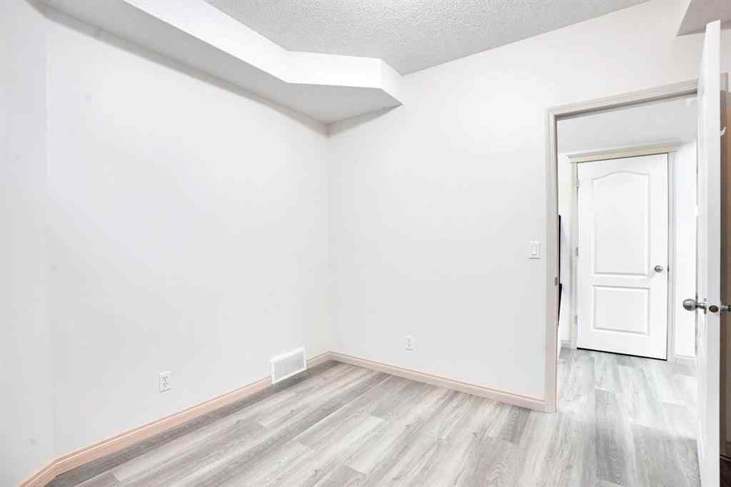 MLS® A2260846 - 38 Strathridge Crescent SW in Strathcona Park Calgary, Residential