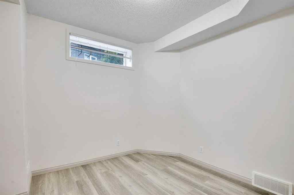 MLS® A2260846 - 38 Strathridge Crescent SW in Strathcona Park Calgary, Residential