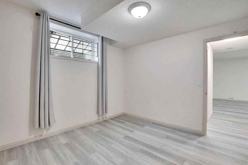 MLS® A2260846 - 38 Strathridge Crescent SW in Strathcona Park Calgary, Residential