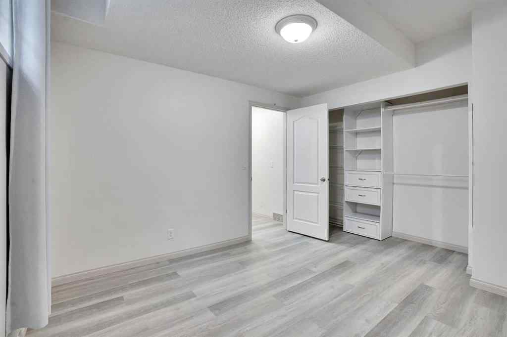 MLS® A2260846 - 38 Strathridge Crescent SW in Strathcona Park Calgary, Residential