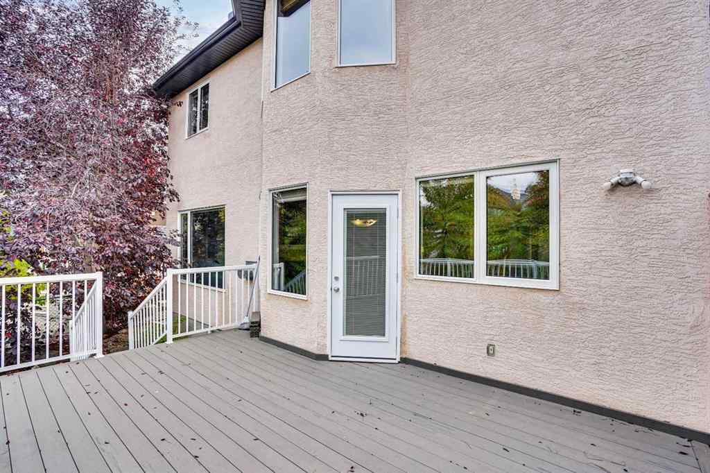 MLS® A2260846 - 38 Strathridge Crescent SW in Strathcona Park Calgary, Residential