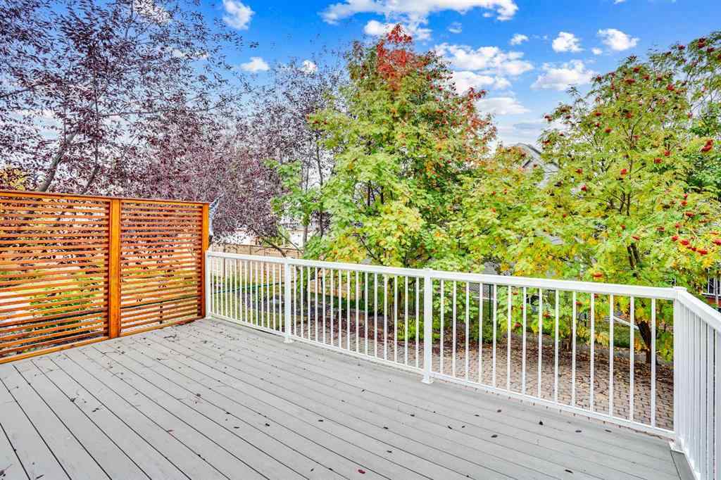 MLS® A2260846 - 38 Strathridge Crescent SW in Strathcona Park Calgary, Residential