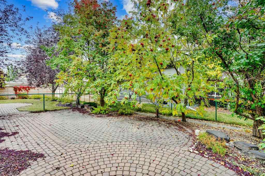 MLS® A2260846 - 38 Strathridge Crescent SW in Strathcona Park Calgary, Residential